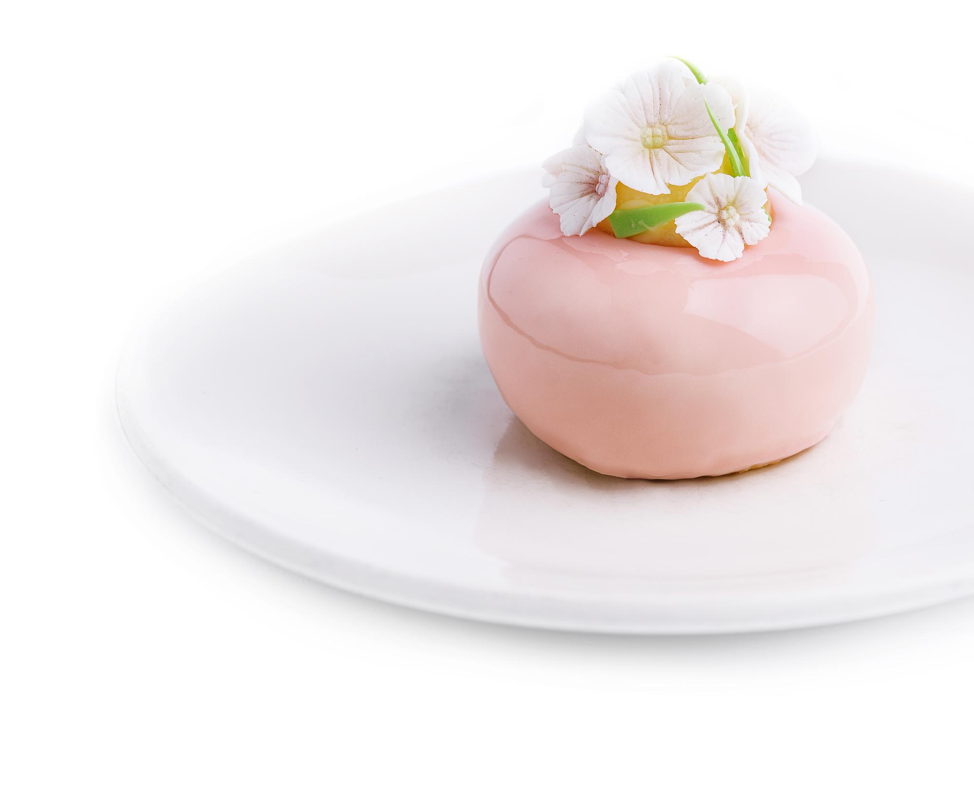 Plated dessert in soft pastel tones